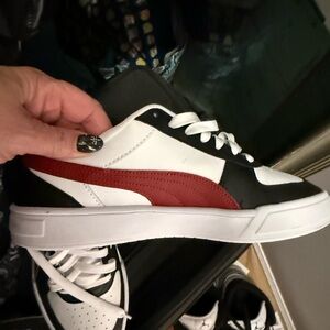 Black, Red, and White Puma Sneakers